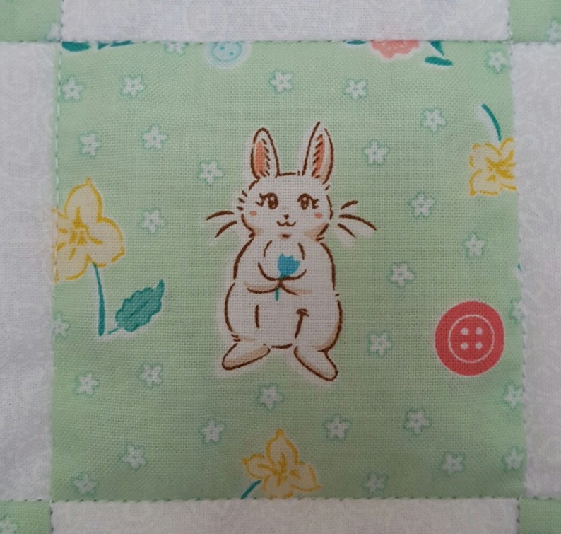 Sweet and Nostalgic WavyScalloped Edge Baby Quilt