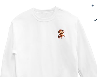 Puede incluir: Sudadera blanca de manga larga con un pequeño diseño de mono bordado en el pecho izquierdo.
