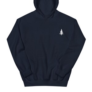 May include: A navy blue hoodie with a white embroidered tree on the left chest.