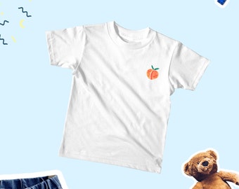 ピーチ柄のキュートなキッズシャツ、ピーチ柄アイコンの子供用Tシャツ、キュートなピーチ柄のキッズTシャツ、キュートなピーチ柄のベビーボディスーツ、キュートなピーチ柄のベビーシャツ、キッズシャツ（ユニセックス）