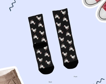 May include: A pair of black socks with a white goose pattern. The socks are shown from the front and back. The front sock has the text "Front" below it and the back sock has the text "Back" below it.