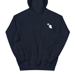May include: Navy blue hoodie with a white ghost graphic and the word "boo" in a speech bubble. The hoodie has a front pocket and a hood. A casual, comfortable garment for everyday wear.