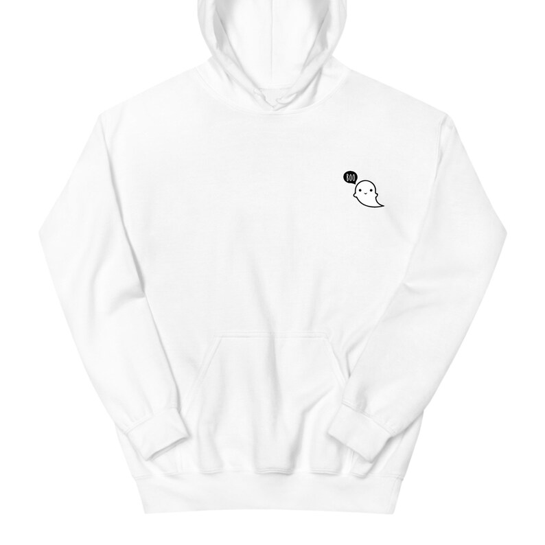 May include: White hooded sweatshirt with a front pocket and drawstring. A small black and white ghost graphic with the word "BOO" in a speech bubble is on the upper left chest. The sweatshirt is made of a soft material.