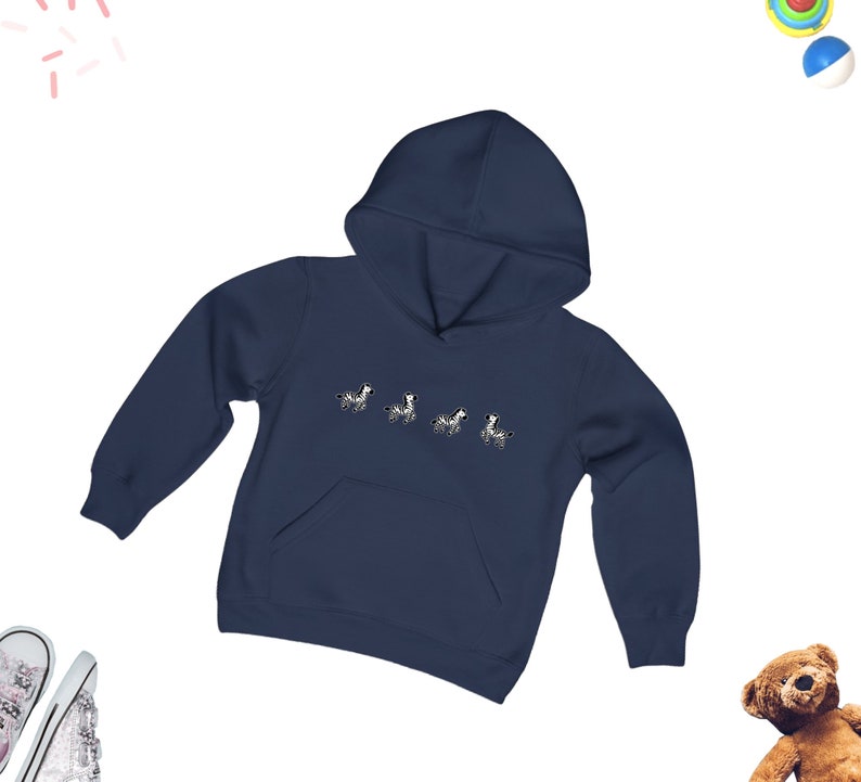 May include: A navy blue hooded sweatshirt with a graphic of five zebras walking in a line. The sweatshirt has a kangaroo pocket and a drawstring hood.