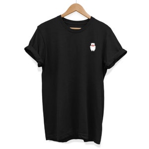 May include: Black t-shirt with a white polar bear wearing a red scarf embroidered on the left chest.