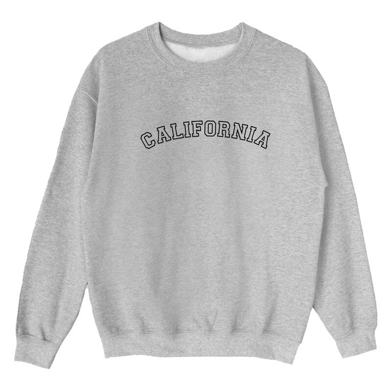 May include: A gray sweatshirt with the word "CALIFORNIA" printed in black on the front.