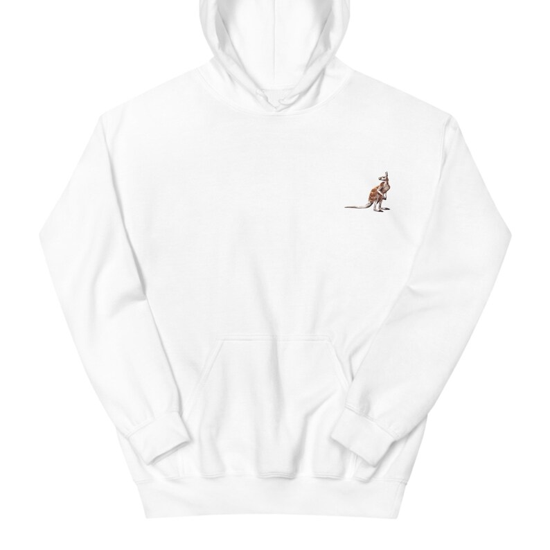 May include: White hoodie featuring a kangaroo design on the upper left chest. The kangaroo is illustrated in brown and tan tones. The sweatshirt includes a front pocket and a drawstring hood. A casual, comfortable garment.