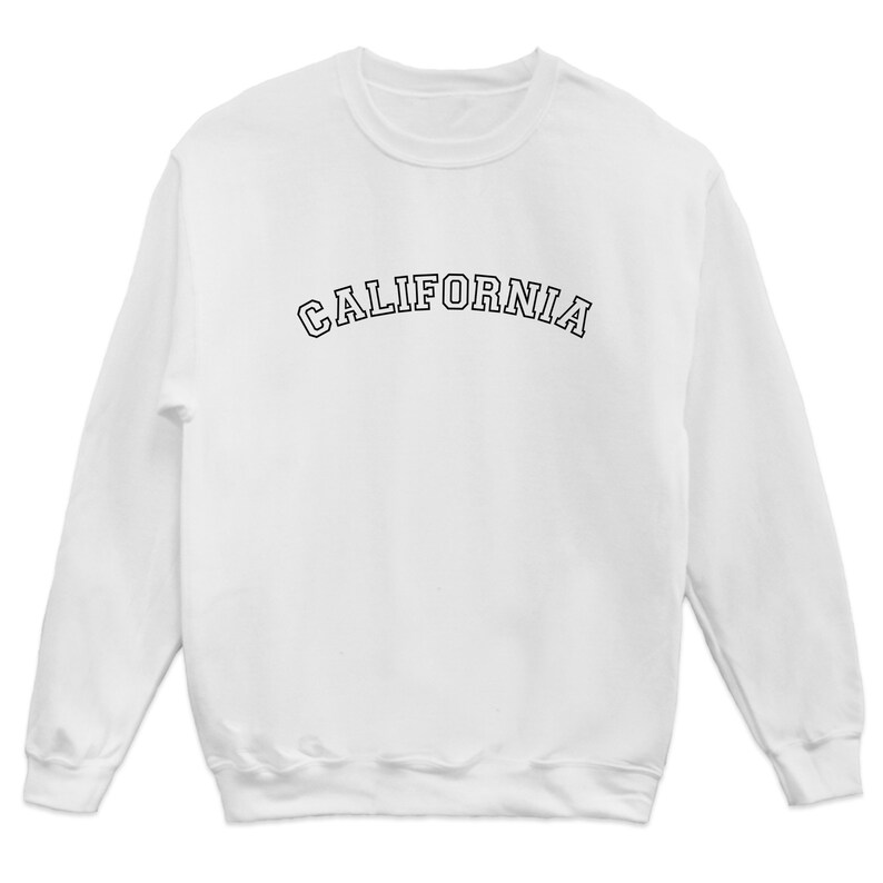 May include: White long-sleeve sweatshirt with a black outline of the word "CALIFORNIA" in an arch across the chest.