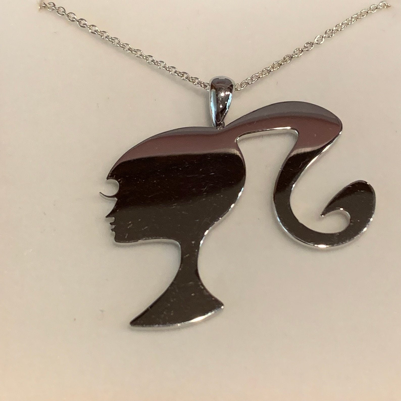 Barbie silhouette 2025 necklace