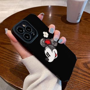 Custodia per iPhone con motivo a parco a tema, custodia per iPhone 16 Pro Max nera con fiocco floreale di Minnie Mouse Disney, custodia per iPhone 15+, custodia per iPhone 14 e altro, cgbha