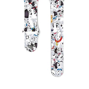 May include: White Apple Watch band with a repeating pattern of Dalmatian dogs. The band is made of silicone and has a white background with black spots.