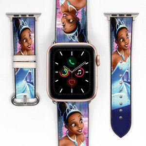 May include: A colourful Apple Watch band with a design featuring Princess Tiana from Disney's The Princess and the Frog. The band is available in white, blue and pink.