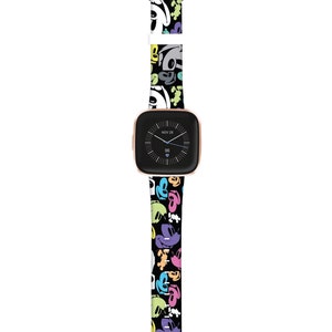 May include: A black watch band with a colorful Mickey Mouse pattern. The watch face displays the date "NOV 28" and the time "96".