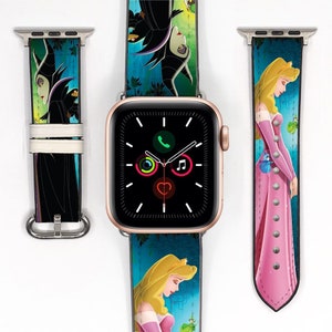 May include: Two Apple Watch bands featuring Disney characters. One band has a pink background with a princess in a pink dress. The other band has a green background with a villain in a black dress.