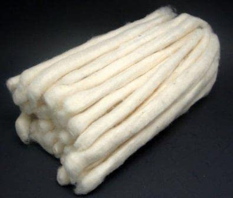 May include: A bundle of white cotton yarn, perfect for crafting projects.