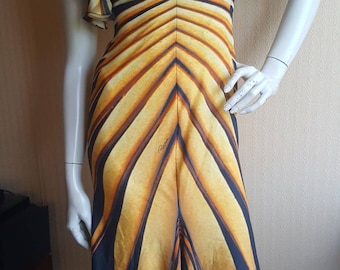 Très jolie robe Roberto Cavalli manches en soie imprimé animal taille M L