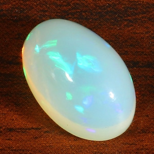 Opale etiope, 10.50 Crt. Trasparente Blu appariscente Fuoco Ovale Forma Cabochon Loose Gemstone, 18x12x10 MM.