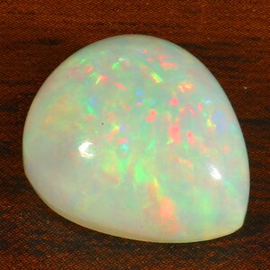8.45 Crt. AAA Ethiopian Opal multi fire cabochon October birthstone, 15x12x8 mm. Pear Shape Loose gemstone per gioielli making Opal Ring.