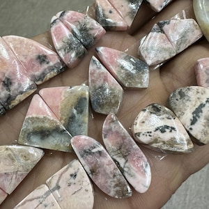 Rhodochrosiet lichte kleur Glad bijpassend paar edelsteenpaar Groothandelpartij met verschillende vormen en maten gebruikt voor het maken van sieraden.