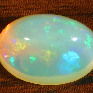 Ethiopian fire Opal Cab, 8.90 Crt. 100% Natural Beautiful Fire Opal Oval Cabochon, 16x11x9 MM. Loose Gemstone For Making Jewelry and Ring.