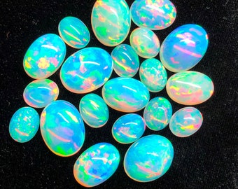 Opale a fuoco naturale, 8x10MM. Opale etiope forma ovale cabochon all'ingrosso opale lotto multi appariscente fuoco pietra preziosa opale per gioielli uso pietra preziosa.