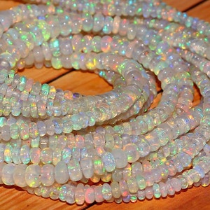 Opal Beads Ethiopian opal multi fire Smooth Rondelle Bead Welo Opal Bead Opal Rondelle beads Opal Beads Fire Opal Beads Flashy Opal Beads.