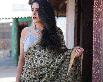 Genda Ajrakh linen silk saree with zari border