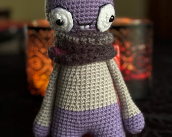 Handmade crochet zombie with scarf