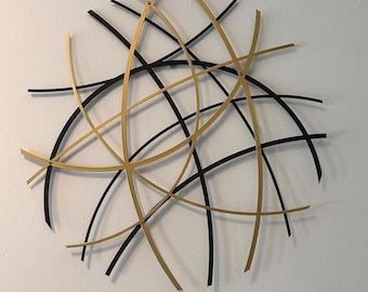 Gold and Black Metal Wall Sculpture: Abstract Circular Decor