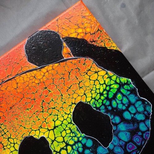 14 x 14 in original fluid art embellished by hand for panda bear lovers. The fluorescent shops background sets the mood for this pop art piece.