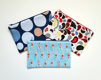 Zippered pouch lined with coated cotton. Ready to ship.