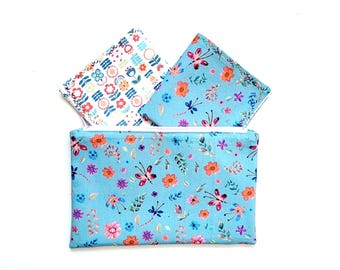 Two double-layered fabric handkerchiefs made of 100% cotton with a zippered pocket. Ready for dispatch.