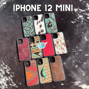 May include: A selection of iPhone 12 Mini phone cases featuring a variety of designs, including floral, geometric, and animal print patterns. The cases are crafted from leather and have a black rubber bumper.