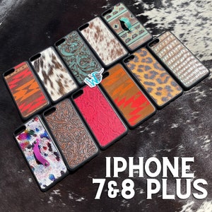 May include: Assortment of iPhone 7 & 8 Plus phone cases with various patterns and textures. The cases feature cowhide, leather, and other materials in colours like brown, red, turquoise, and white.