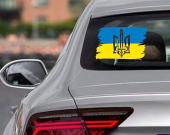 May include: A silver car with a blue and yellow Ukrainian flag sticker on the back window. The car has a license plate that says "A7 D".