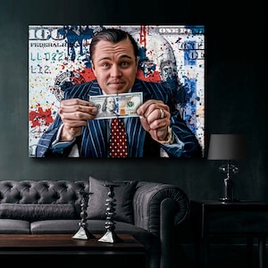 May include: A painting of a man holding a $10 bill in front of a background of a $100 bill with colorful paint splatters. The man is wearing a blue suit with a red and white polka dot tie.