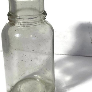 One (1) Antique Round Base Clear Glass Generic Medicine Bottle Excellent Condition Circa the Early 1900s