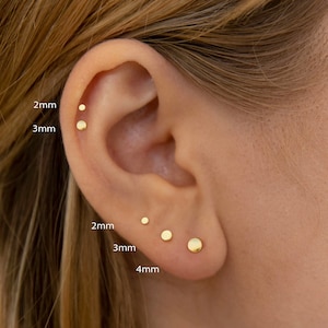 Flat stud earrings silver top