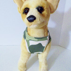 May include: A plush toy chihuahua wearing a green and white camouflage print dog vest.