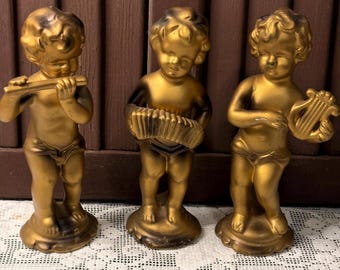 Vintage Trio of Gold tone Cherubs playing musical instruments made in Japan Set of 3
