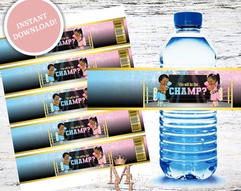 May include: Five blue and pink water bottle labels with a boxing ring and two cartoon babies in boxing gloves. The text on the labels reads "Who will be the CHAMP?"