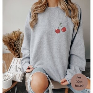 Cherry store print sweater