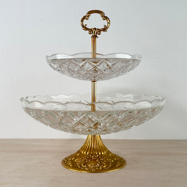 2 Tier Tidbit Server, Serving Plate, thick glass bowls and the metal hardware is gold coloured, great heavy timeless centrepiece dish