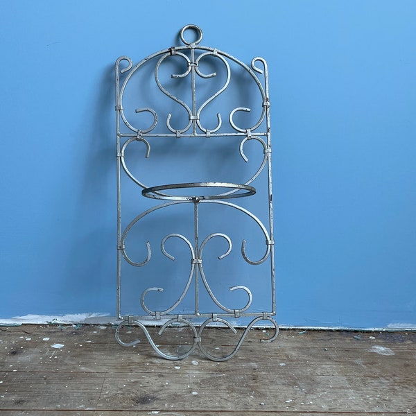 Beautiful rustic iron garden fence, hanging flower pot