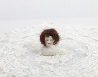 ANCIENNE TÊTE DE Poupée en Porcelaine miniature yeux de verre marque