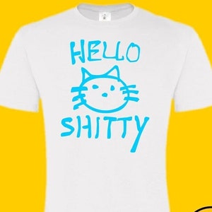 May include: White t-shirt with a blue cartoon cat and the text "Hello Shitty" printed on the front.