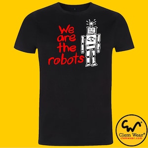 May include: Black t-shirt with a white robot illustration and the text "We are the robots" in red.