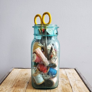 Vintage Blue Ball Ideal Mason Jar with Sewing Knick Knacks. Old Wooden Spools and Scissors. Antique Sewing