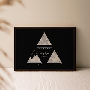 May include: Black and white print with three triangles. Each triangle features a map with the words "met", "engaged", and "married" underneath. The text "Anna & Scott" and "Life is always an adventure with you" are also included.