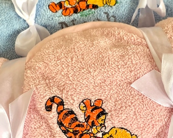 Personalised Winnie the Pooh hooded baby towel in white, pink, or blue